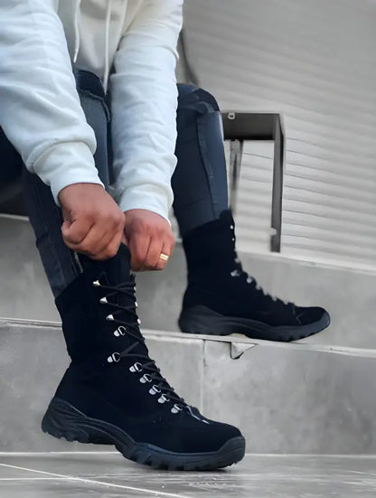 Black lace-up combat boots with rugged soles.