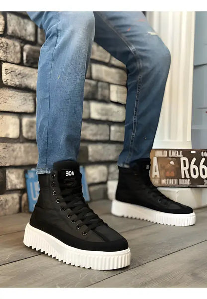 Black high-top sneakers with thick white platform soles and laces.