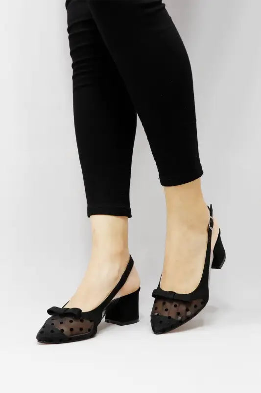 Black mesh slingback heels with bow detail and block heel.