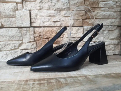 Black leather slingback heels with chunky square heels.