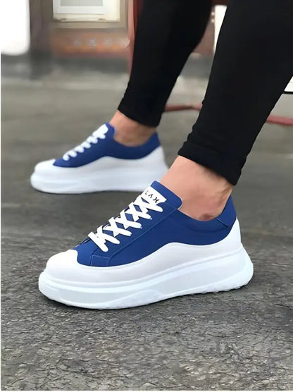 Blue and white platform sneakers with chunky soles and white laces.