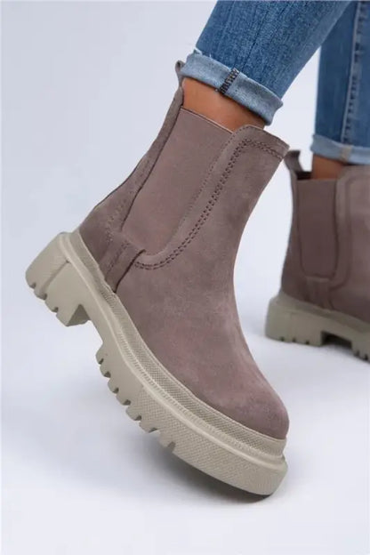 Taupe Chelsea boot with chunky platform sole and elastic side panels.